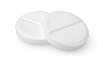 Two white circular paracetamol tables