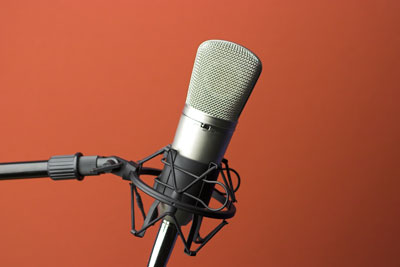 Microphone on orange background