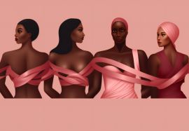 Four women with pink ribbons different nationalities
